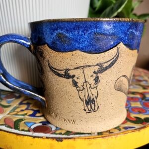 Blue and Tan Ceramic Mug with Western Designs